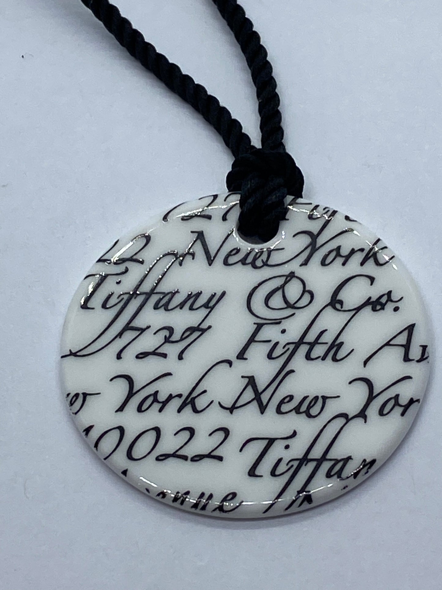 Tiffany & Co White Bone Script New York Fifth Ave Round Silk Cord 16" Necklace