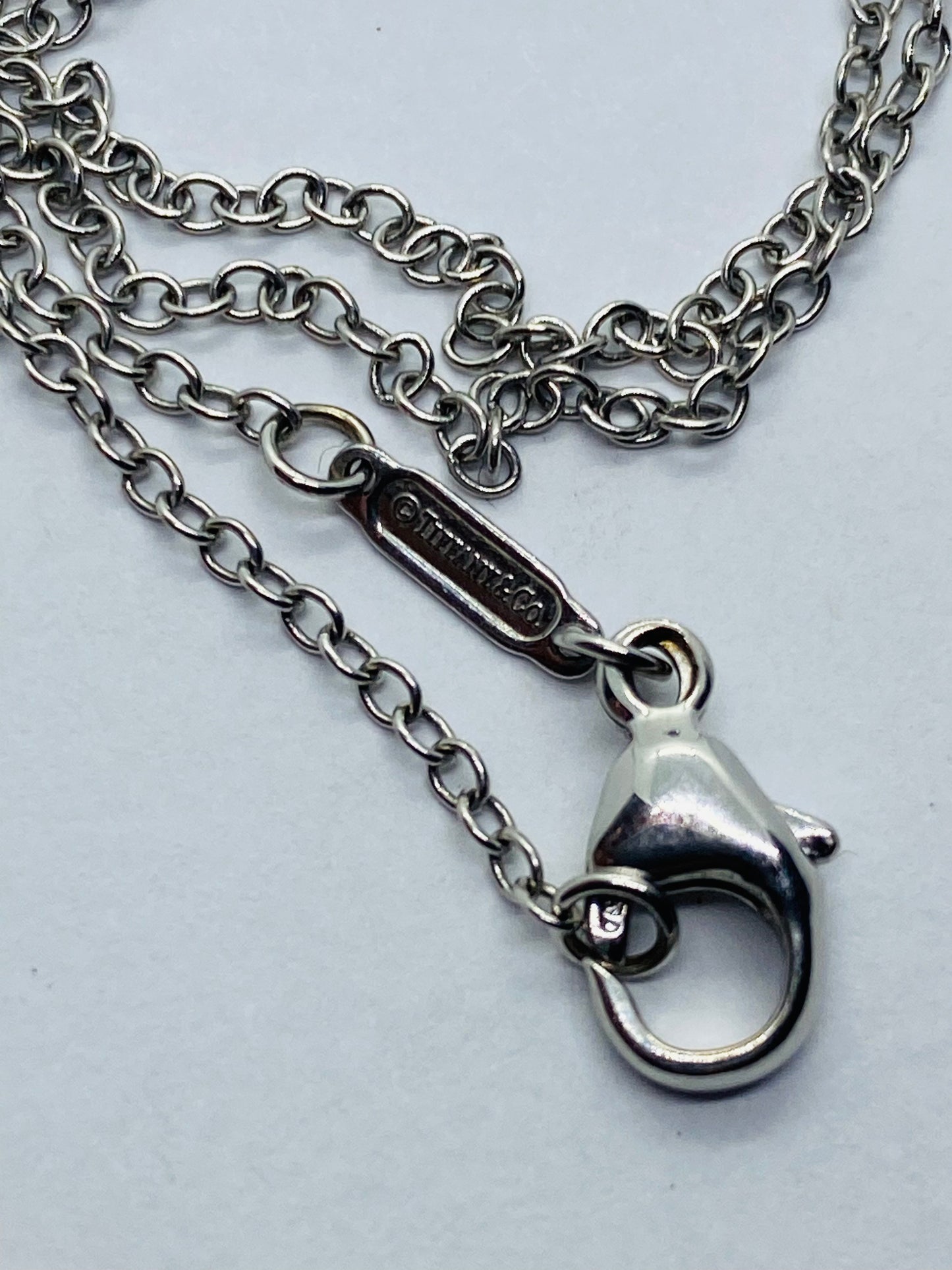 Tiffany & Co Diamond Shell Necklace 18k 750 White Gold 16” 7.3 Grams. Pouch Box
