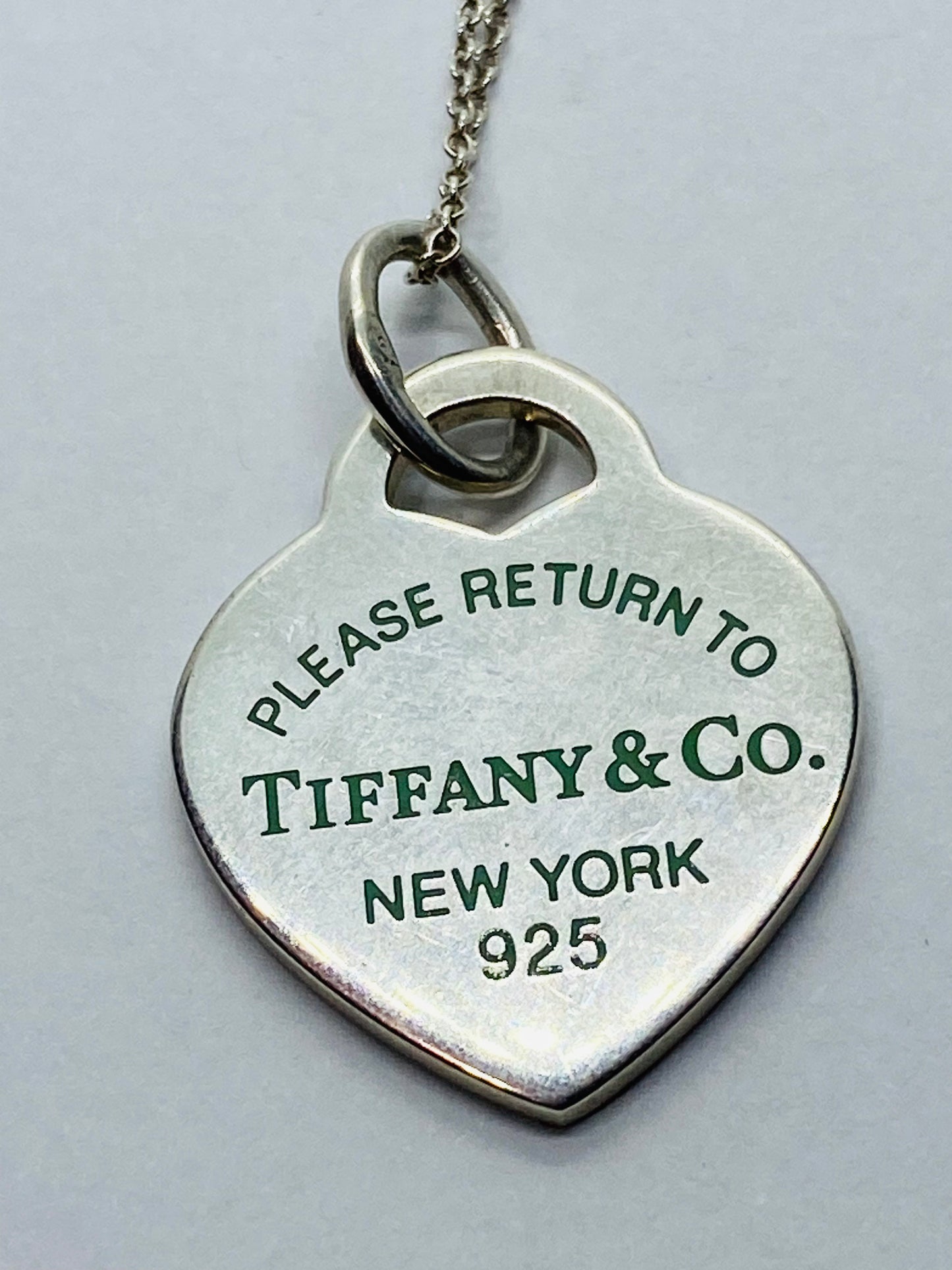 Return to Tiffany & Co. Blue Enamel Font/Writing Heart Charm Sterling Silver