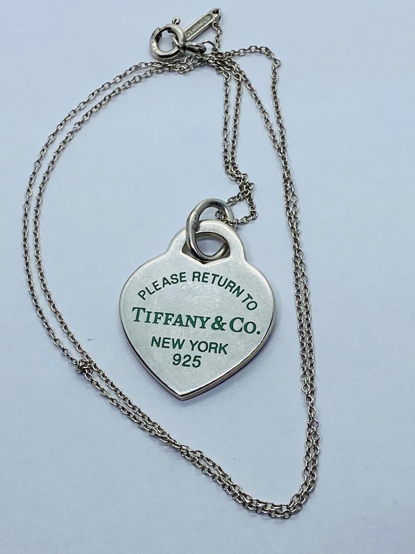 Return to Tiffany & Co. Blue Enamel Font/Writing Heart Charm Sterling Silver