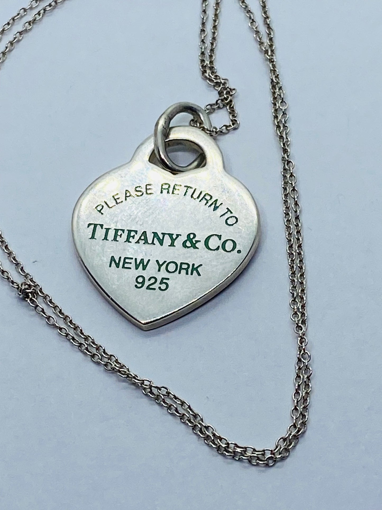 Return to Tiffany & Co. Blue Enamel Font/Writing Heart Charm Sterling Silver