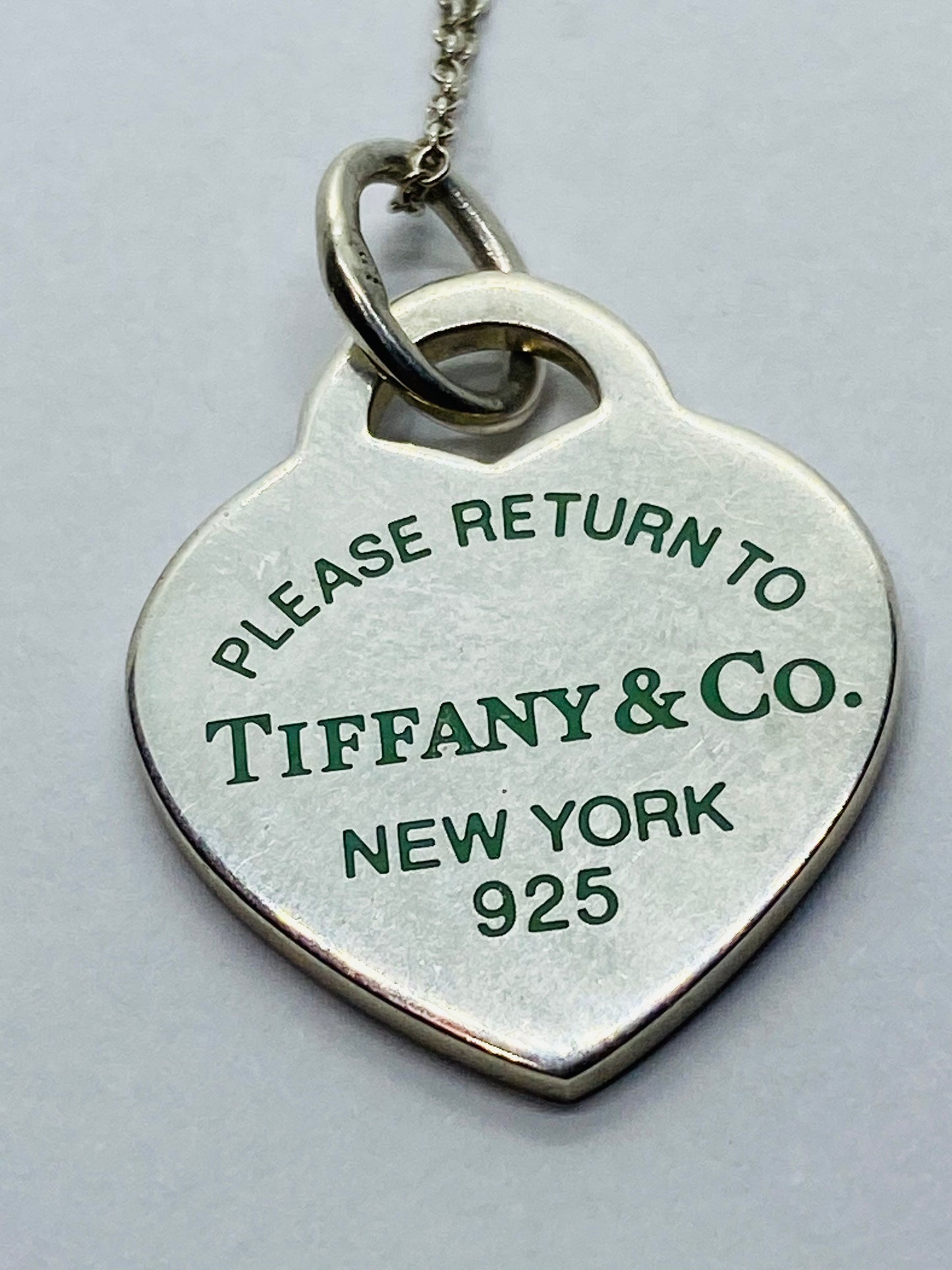 Return to Tiffany & Co. Blue Enamel Font/Writing Heart Charm Sterling Silver