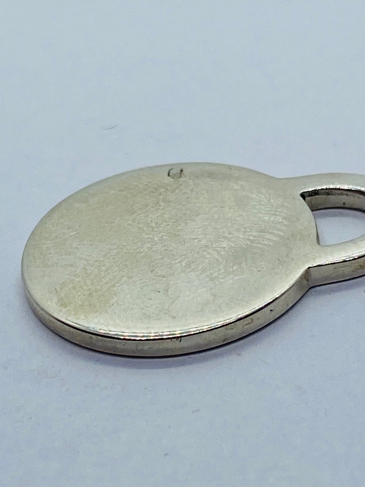 Tiffany & Co. Medium Sterling Silver .925 Round Tag Charm Pendant