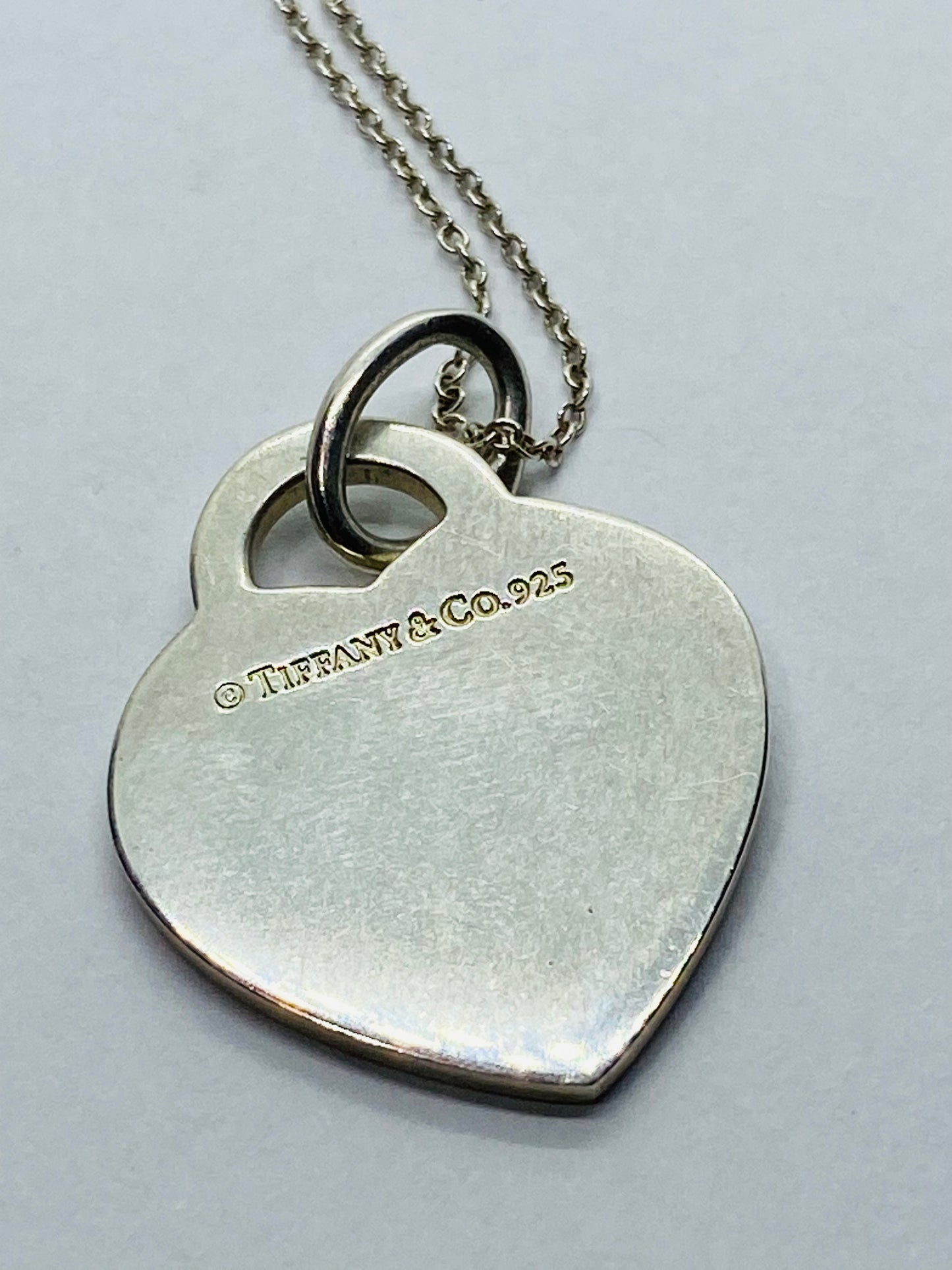 Return to Tiffany & Co. Blue Enamel Font/Writing Heart Charm Sterling Silver