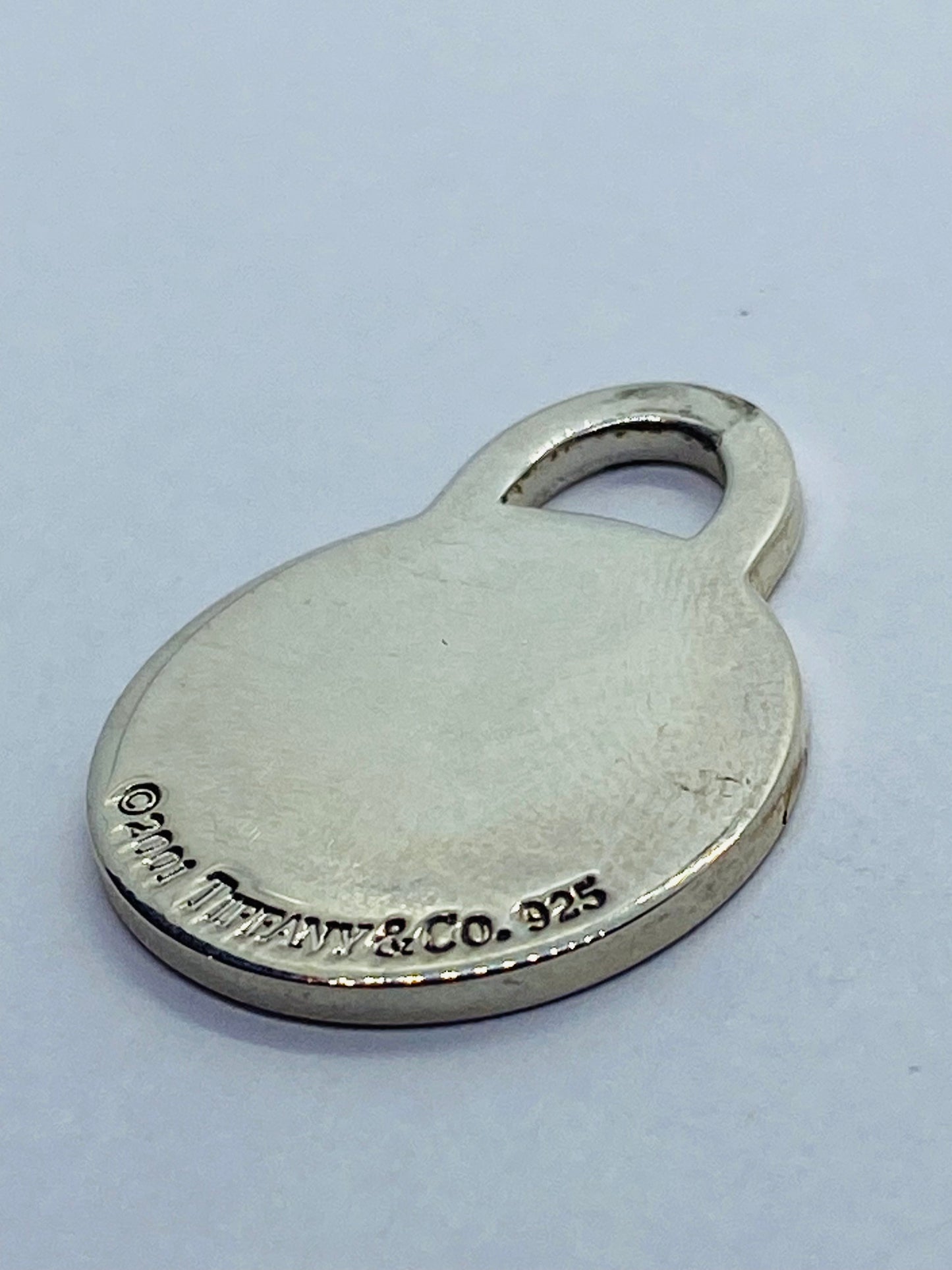 Tiffany & Co. Medium Sterling Silver .925 Round Tag Charm Pendant