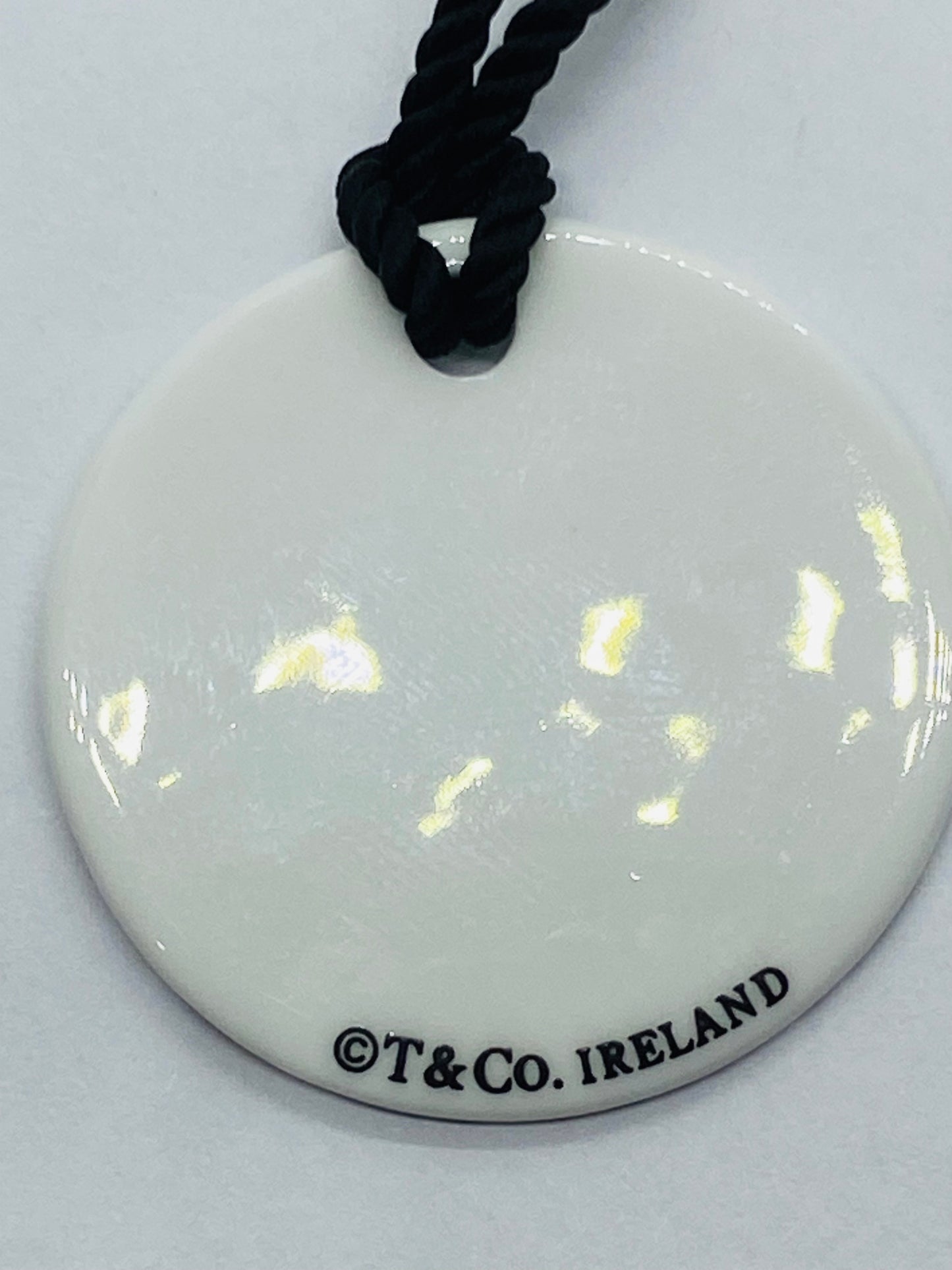 Tiffany & Co White Bone Script New York Fifth Ave Round Silk Cord 16" Necklace