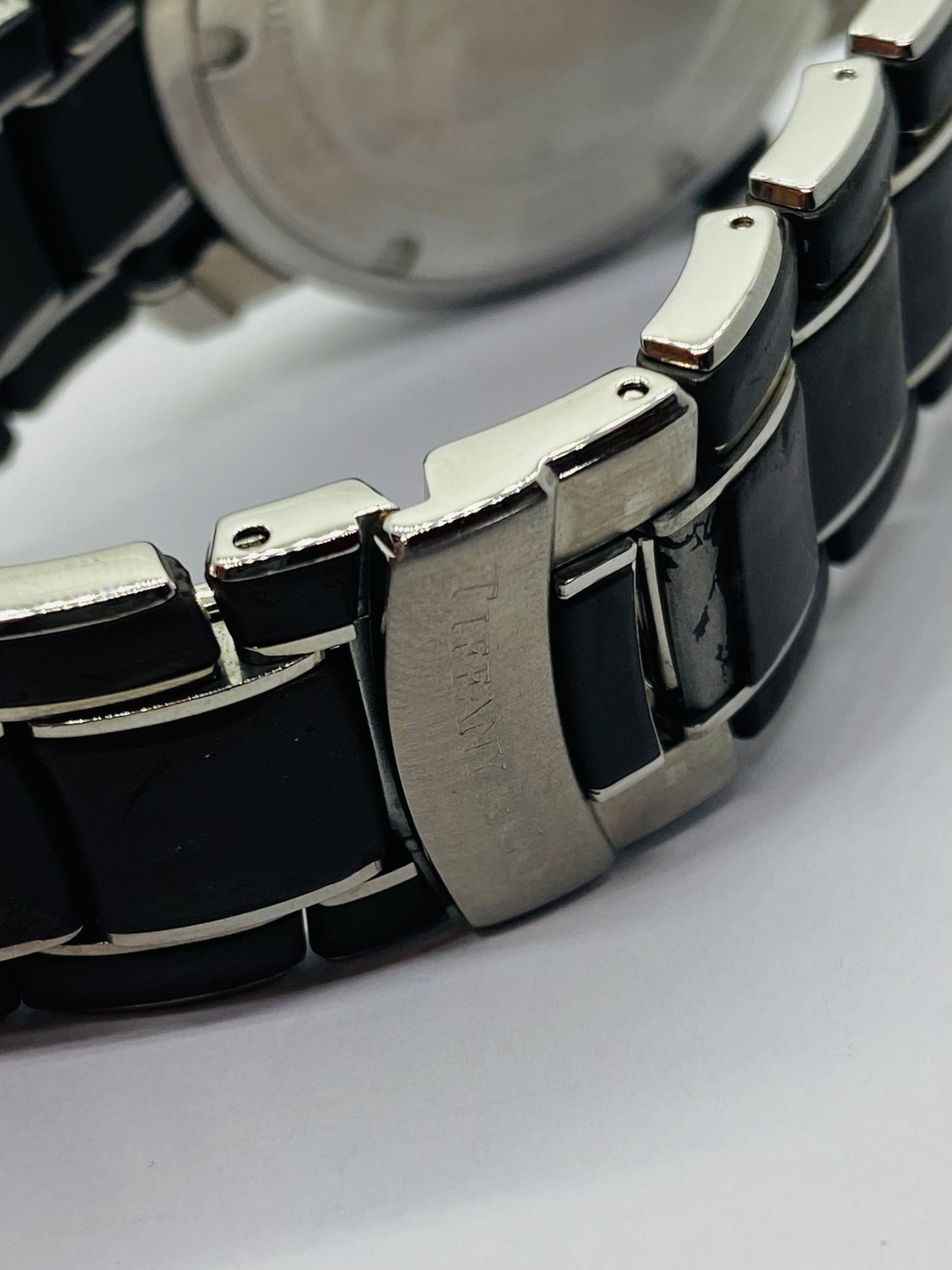 Tiffany Resonator T-57 Quartz Watch With Gray Rubber And Stainless Band (read)