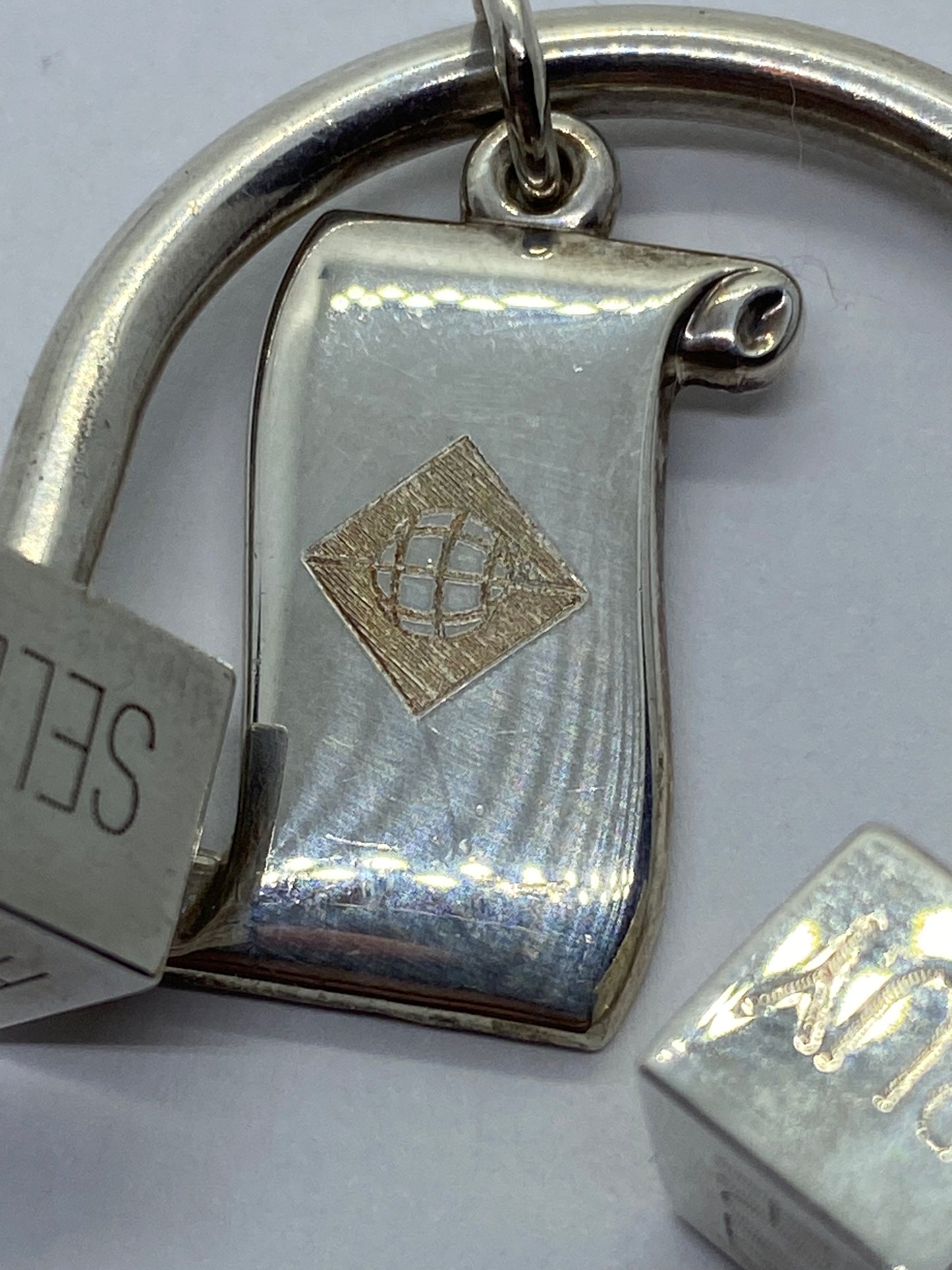 Tiffany & Co Silver Buy Sell Hold Key Ring Key Chain!
