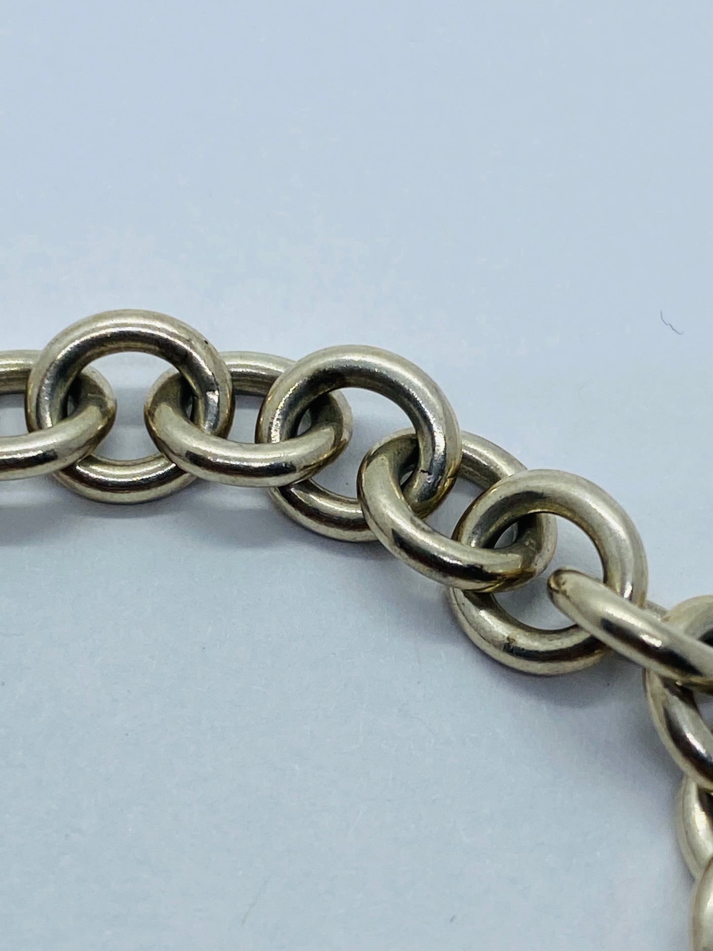 Tiffany & Co. Silver Notes Wavy Round Circle Pendant Bracelet 7.5”
