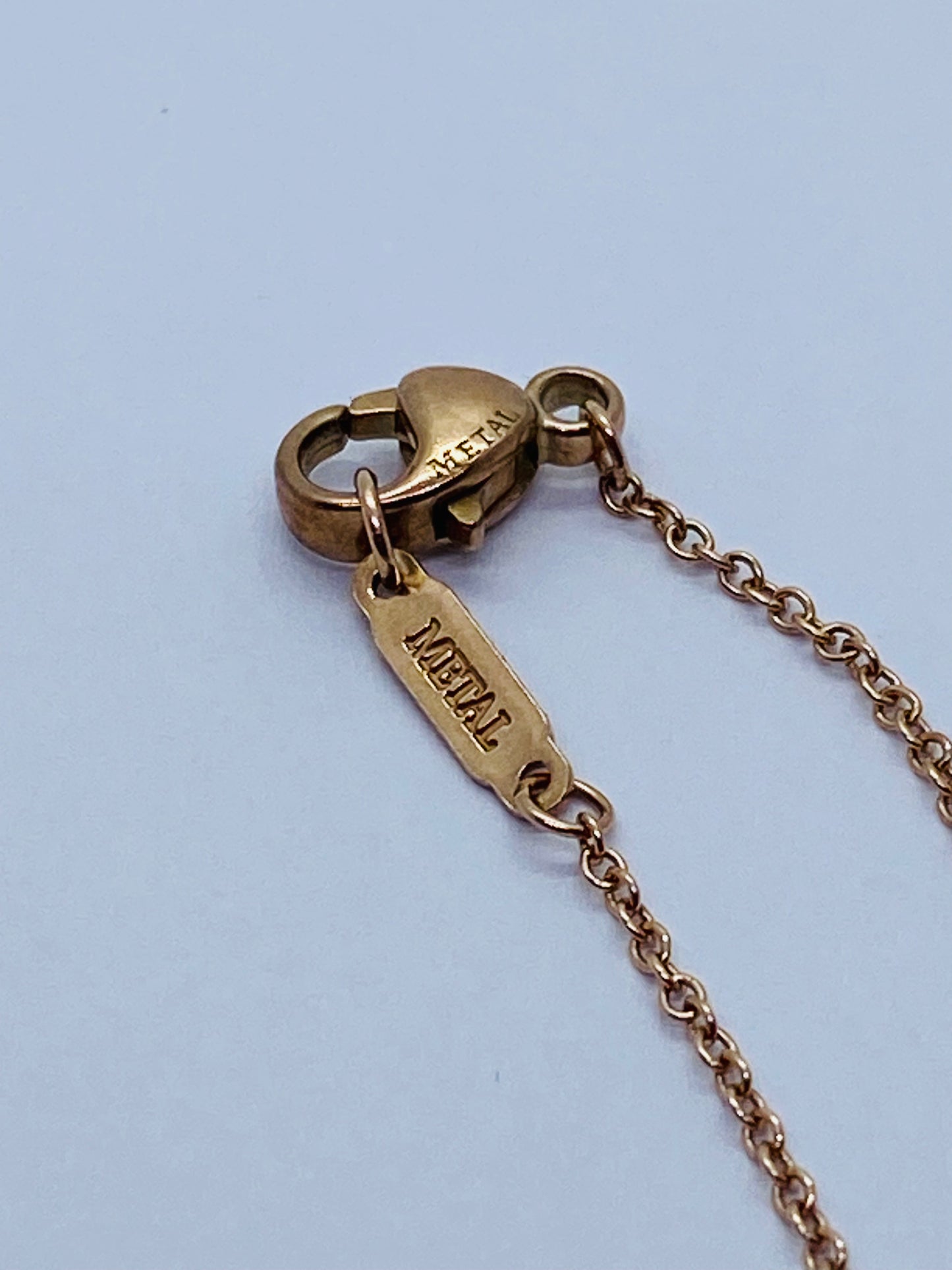 Tiffany & Co. Pink Rubedo Metal Enchant Circle Pendant Necklace 20"
