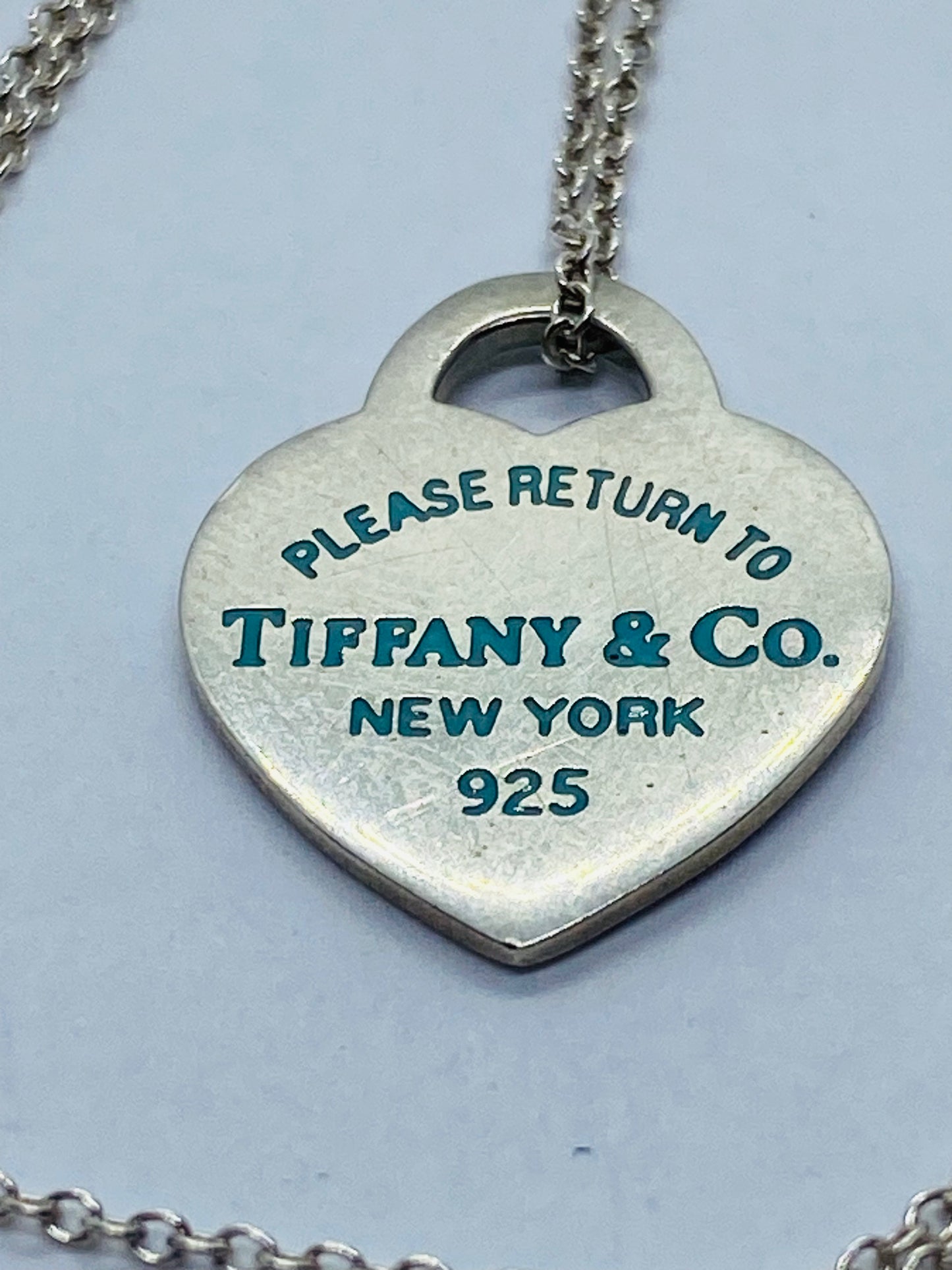 Return to Tiffany & Co. Blue Enamel Font/Writing Heart Charm Sterling Silver