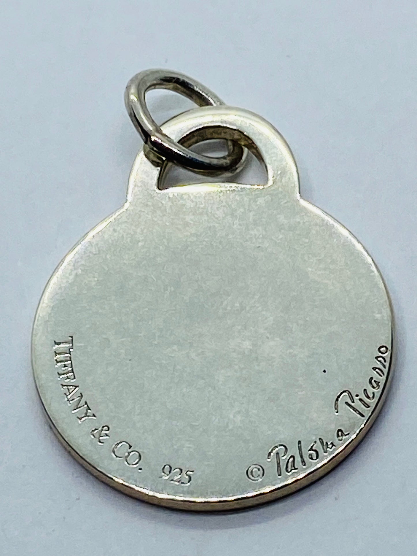 TIFFANY & CO STERLING SILVER PALOMA PICASSO ROUND TAG FOB CHARM