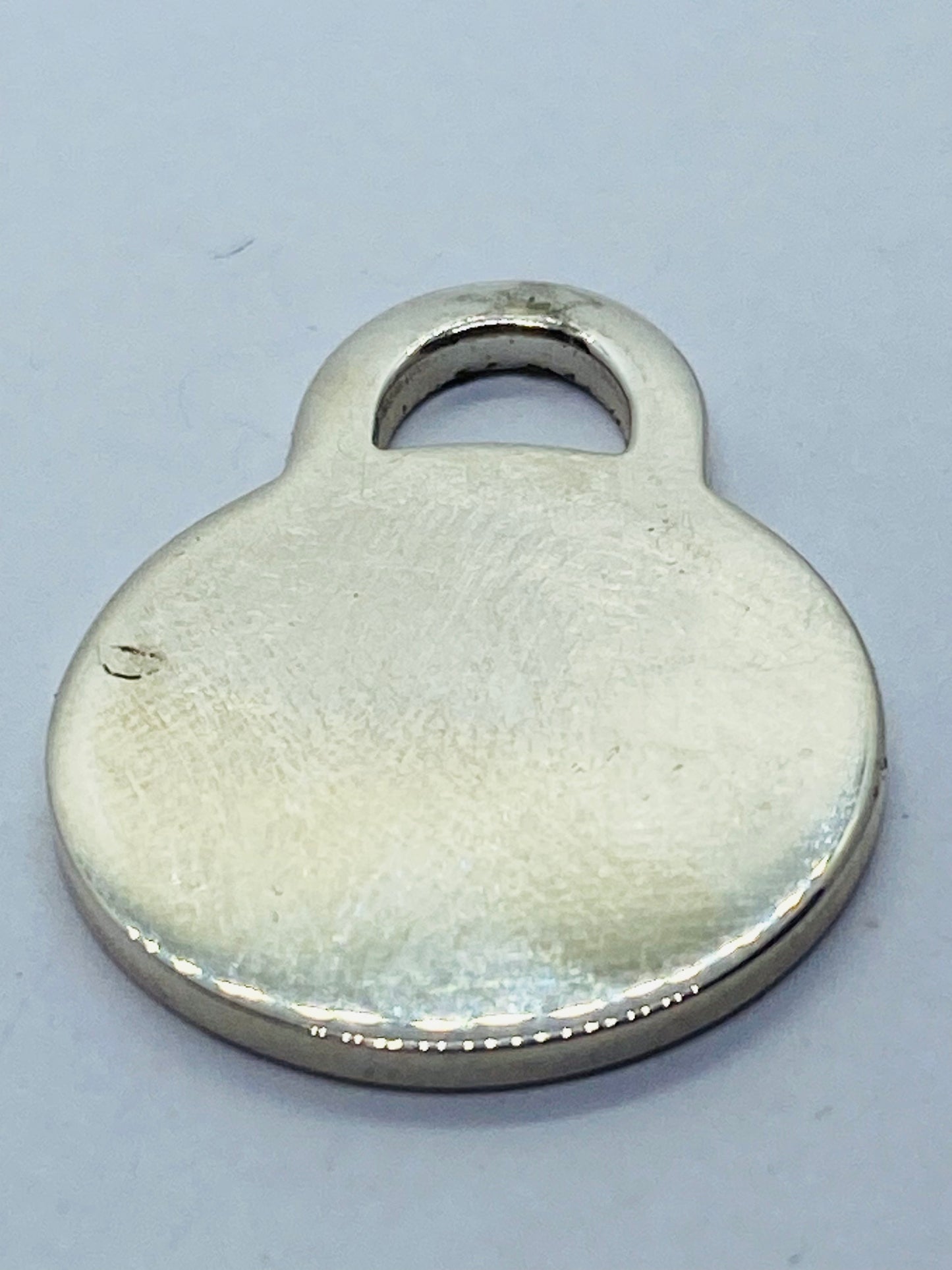 Tiffany & Co. Medium Sterling Silver .925 Round Tag Charm Pendant