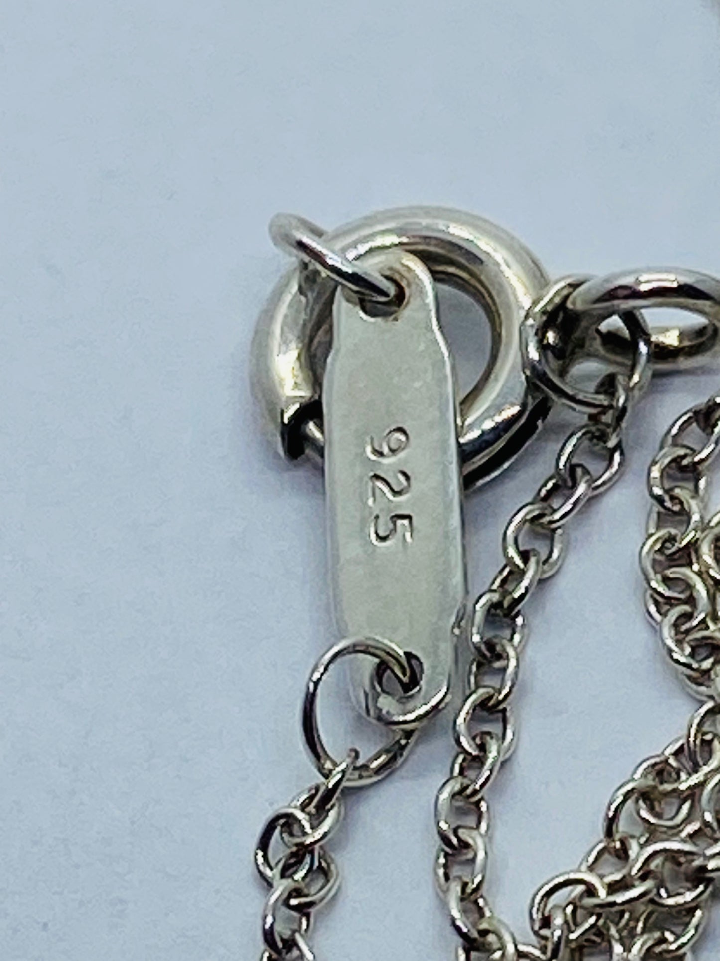 Return to Tiffany & Co. Blue Enamel Font/Writing Heart Charm Sterling Silver
