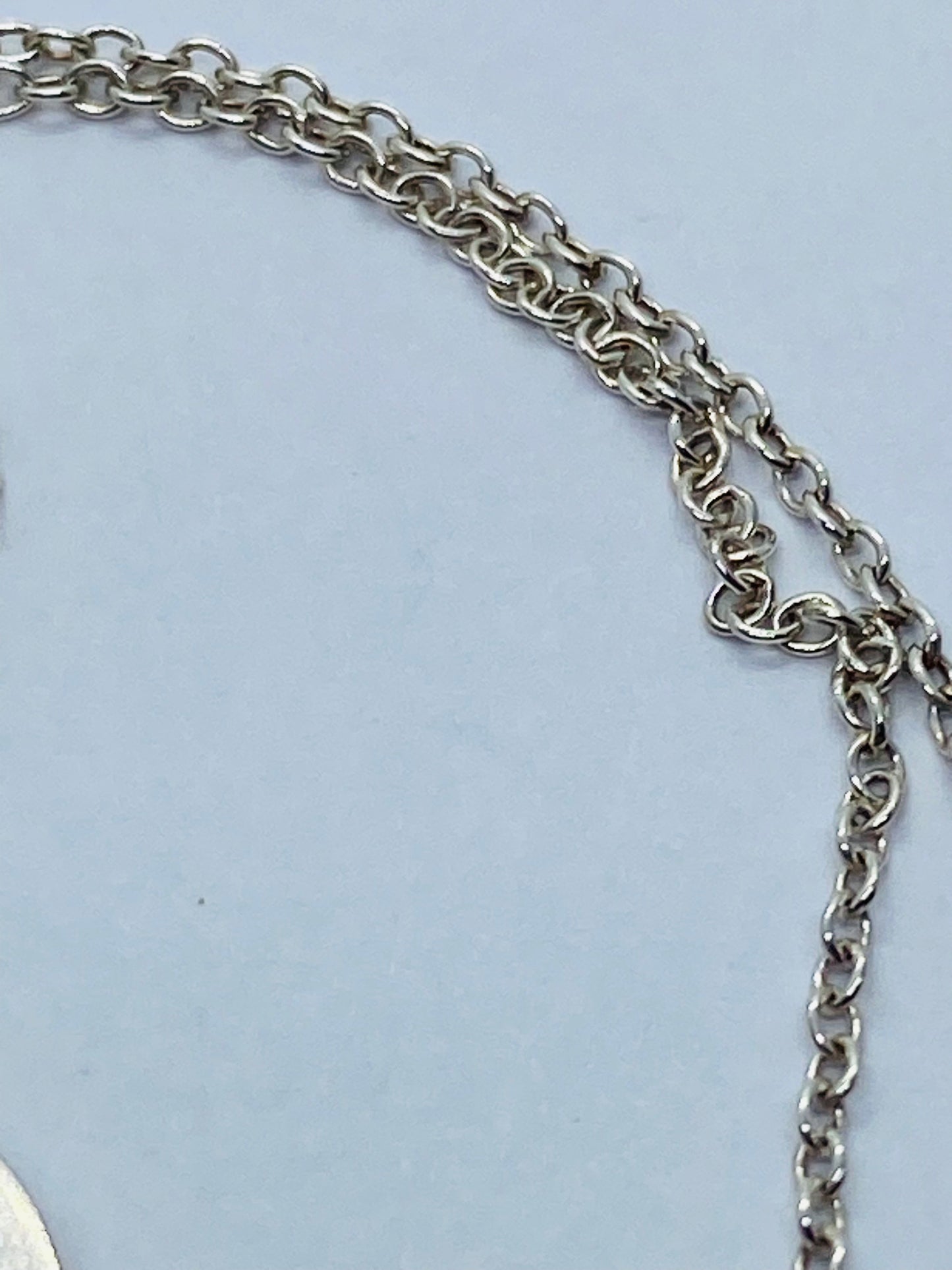 Return to Tiffany & Co. Blue Enamel Font/Writing Heart Charm Sterling Silver