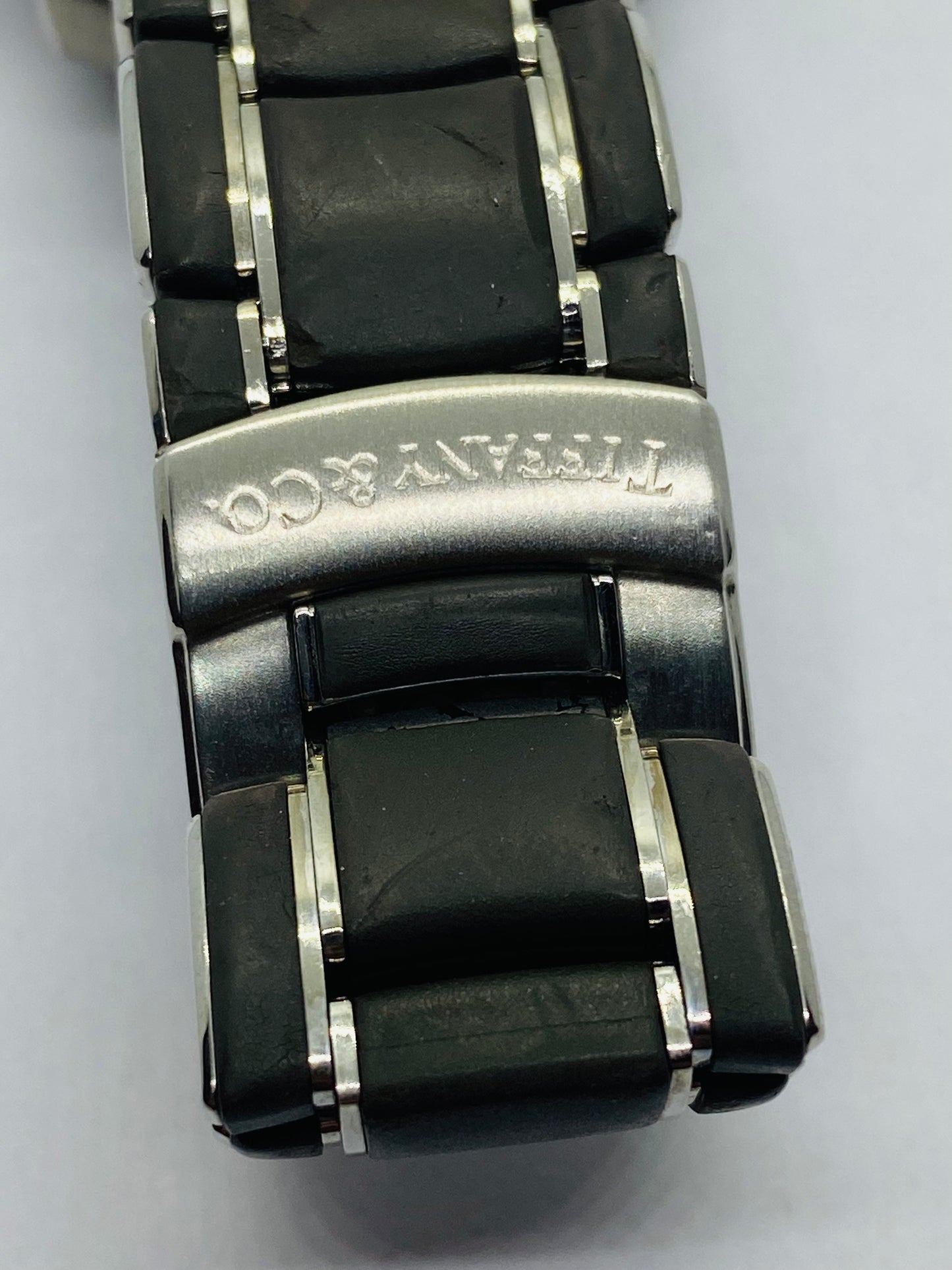 Tiffany Resonator T-57 Quartz Watch With Gray Rubber And Stainless Band (read)