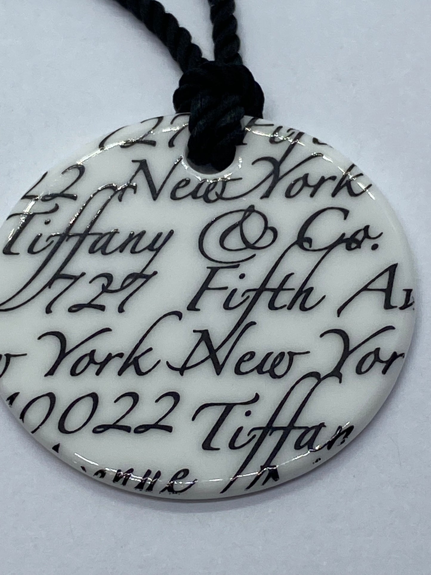 Tiffany & Co White Bone Script New York Fifth Ave Round Silk Cord 16" Necklace