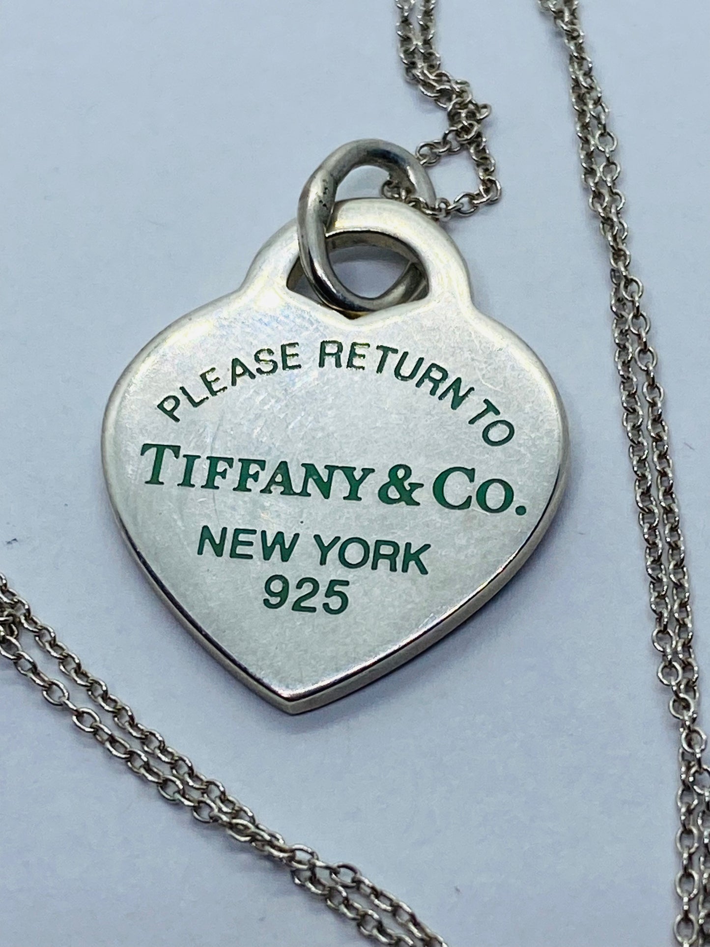 Return to Tiffany & Co. Blue Enamel Font/Writing Heart Charm Sterling Silver