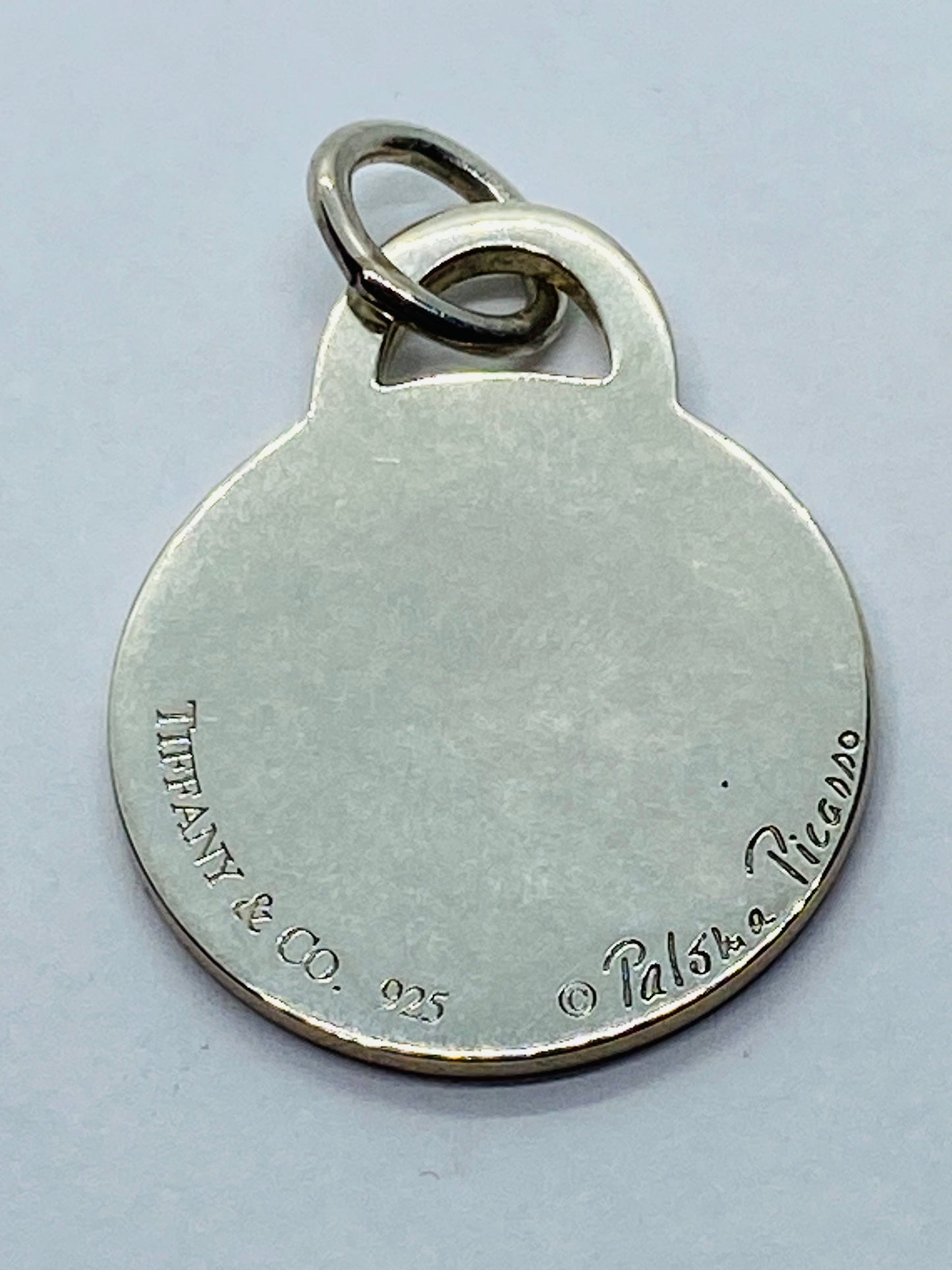 TIFFANY & CO STERLING SILVER PALOMA PICASSO ROUND TAG FOB CHARM