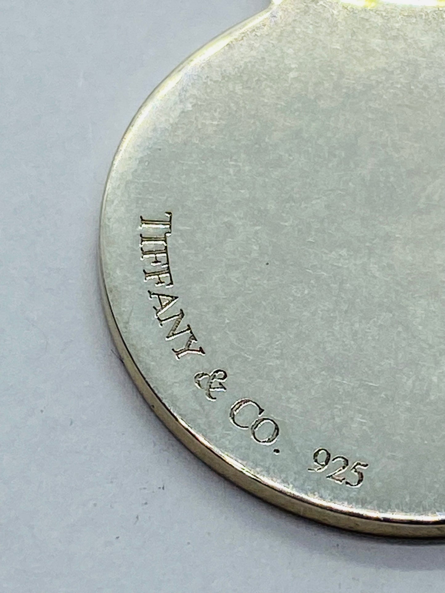 TIFFANY & CO STERLING SILVER PALOMA PICASSO ROUND TAG FOB CHARM