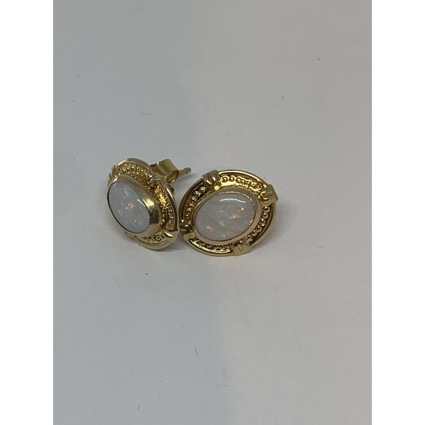 14K Yellow Gold 7.5x5mm Opal Stud Earrings
