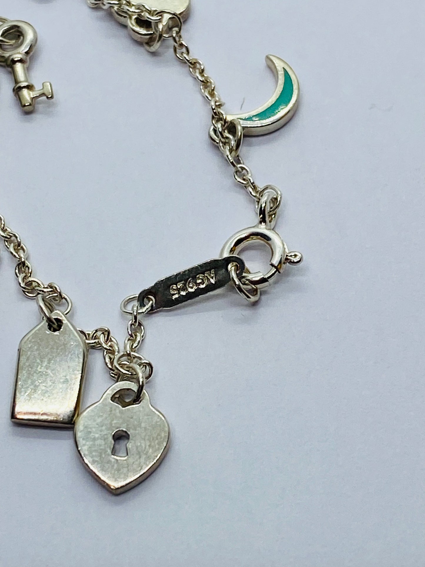 Tiffany & Co Sterling Silver  Blue Enamel Mini Charm Bracelet