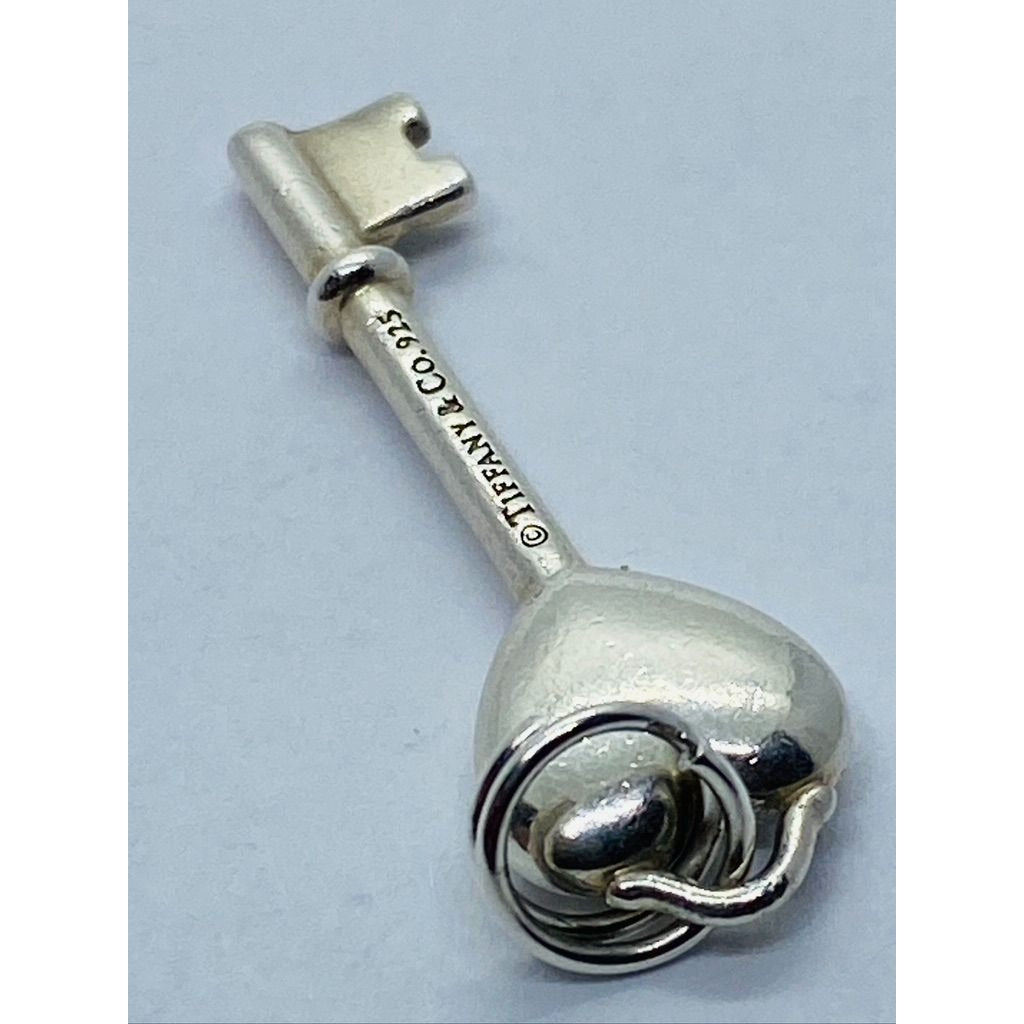 Tiffany & Co. Sterling Silver Pink Sapphire Heart Key Style Pendant 28MM