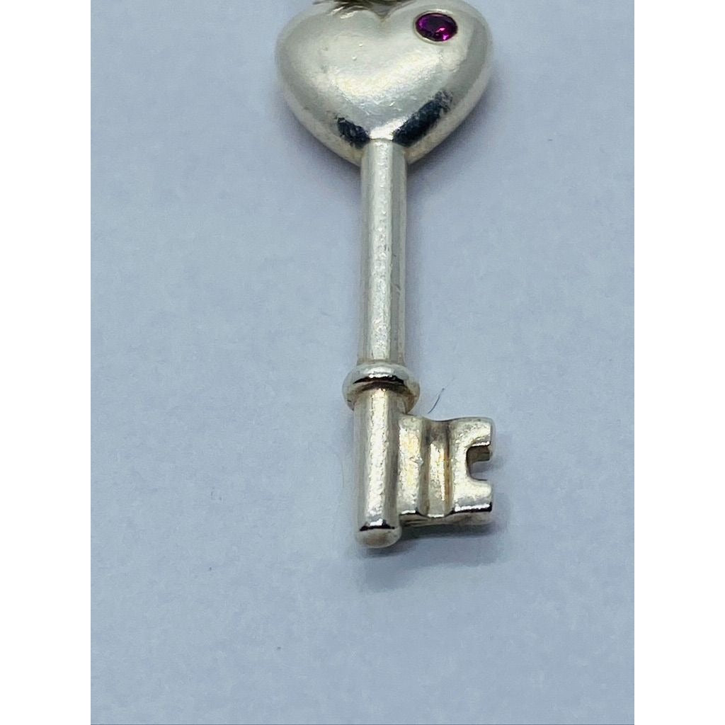Tiffany & Co. Sterling Silver Pink Sapphire Heart Key Style Pendant 28MM