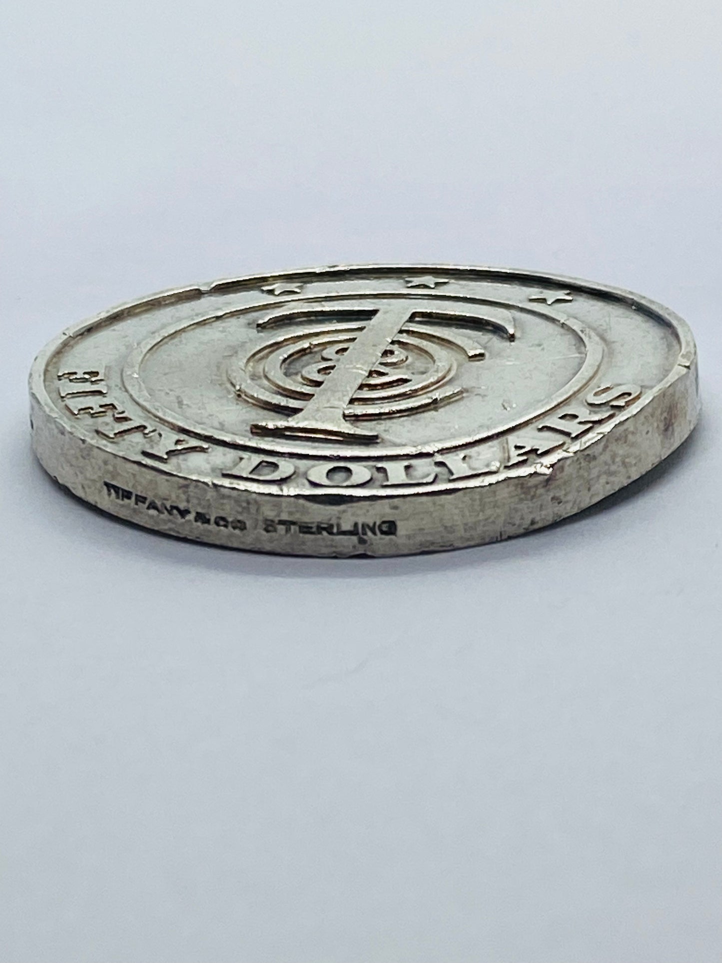 TIFFANY 50 DOLLAR SILVER MERCHANDISE COIN RETIRED See Pictures. 29.1 Grams