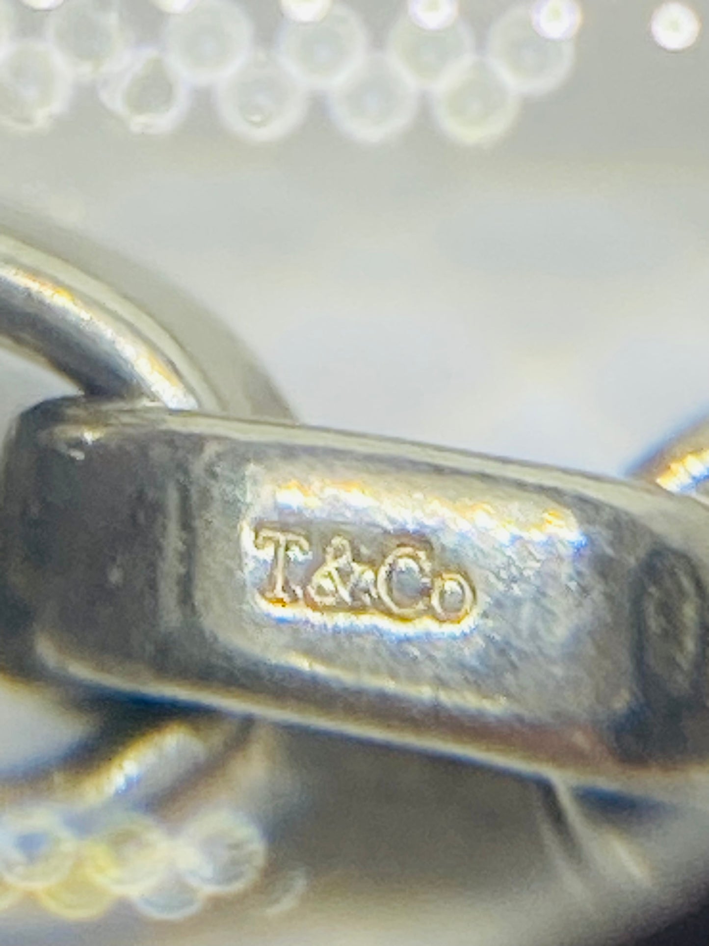 Tiffany & Co. Sterling Silver 7” Donut Link Bracelet.  Pouch