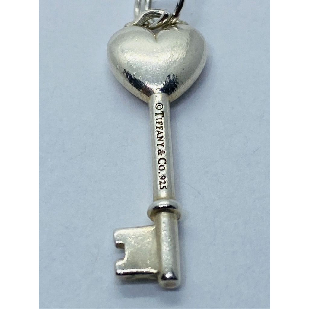 Tiffany & Co. Sterling Silver Pink Sapphire Heart Key Style Pendant 28MM