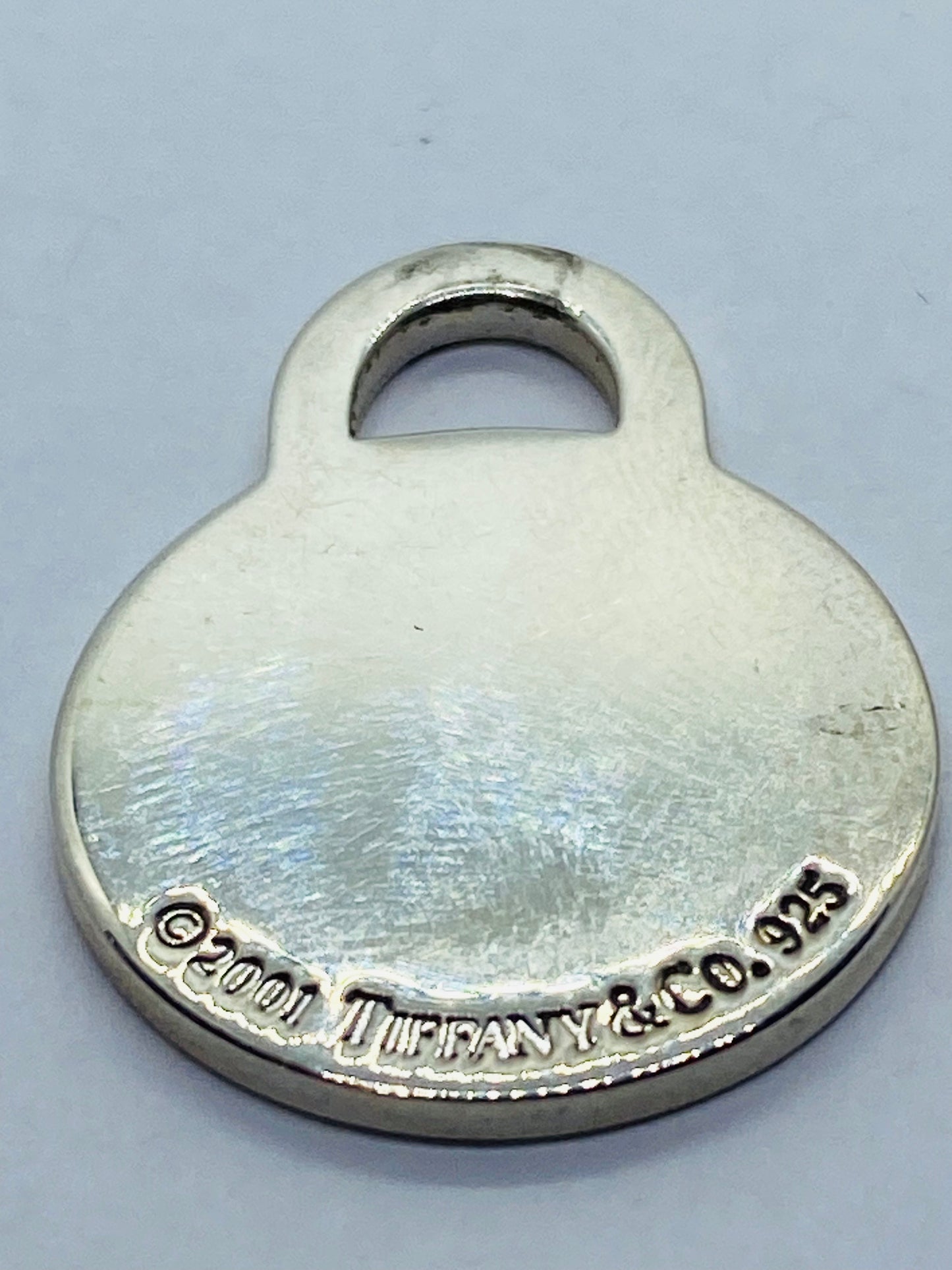 Tiffany & Co. Medium Sterling Silver .925 Round Tag Charm Pendant