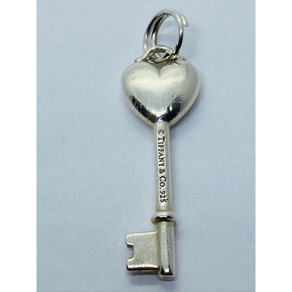 Tiffany & Co. Sterling Silver Pink Sapphire Heart Key Style Pendant 28MM