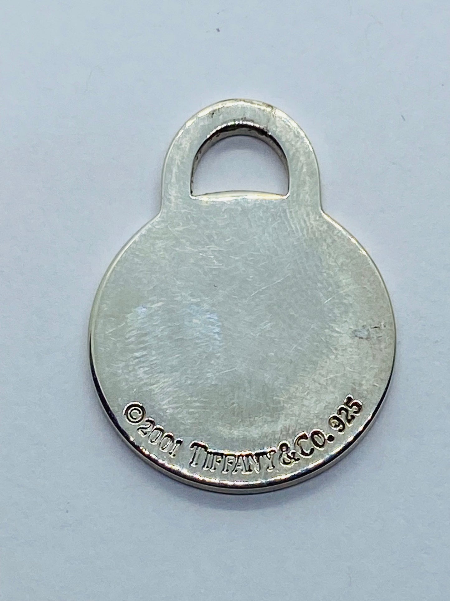 Tiffany & Co. Medium Sterling Silver .925 Round Tag Charm Pendant