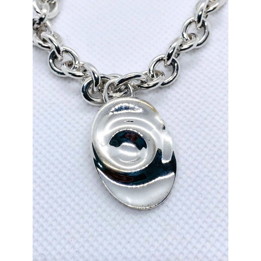 Tiffany & Co Silver Rolo Bracelet with Zodiac Aquarius charm 7.5"