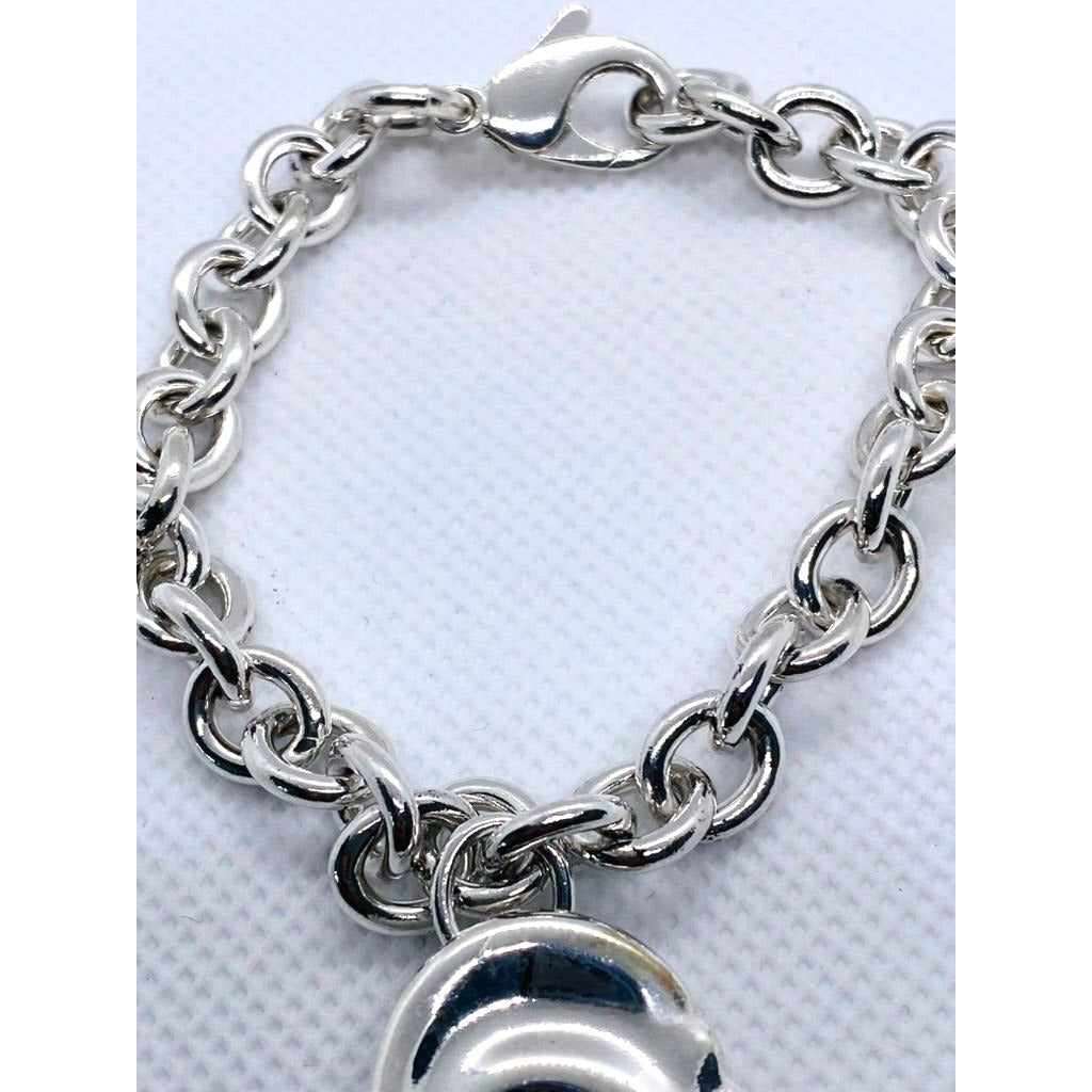 Tiffany & Co Silver Rolo Bracelet with Zodiac Aquarius charm 7.5"