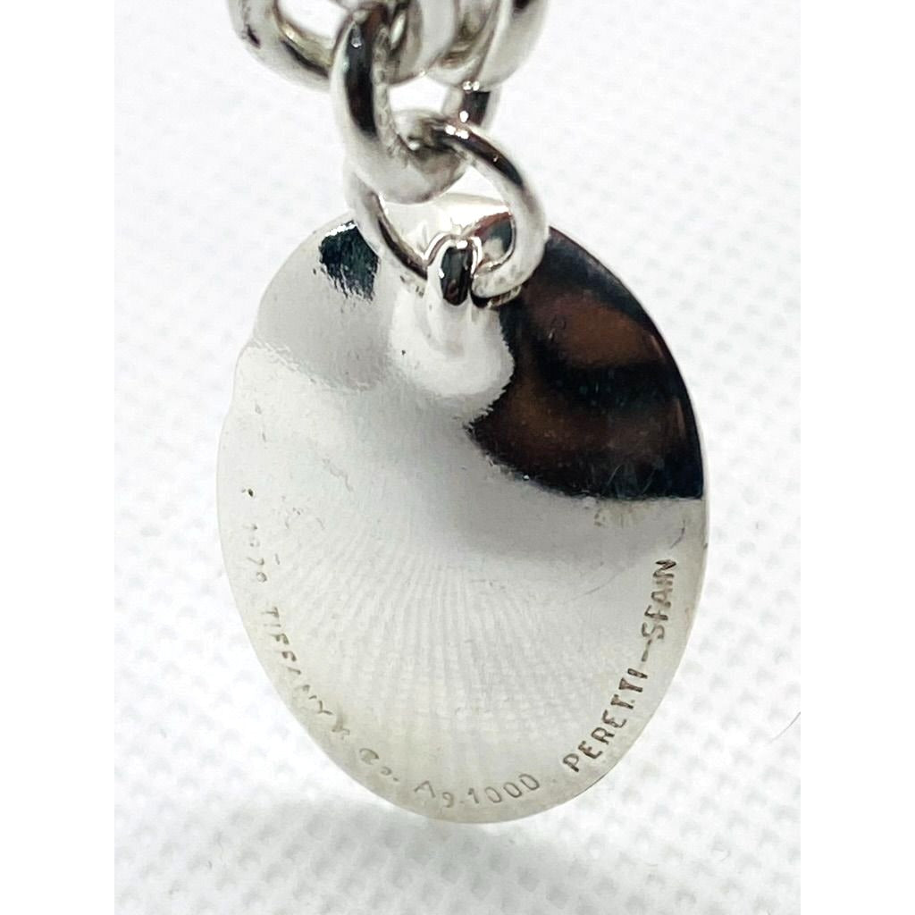 Tiffany & Co Silver Rolo Bracelet with Zodiac Aquarius charm 7.5"