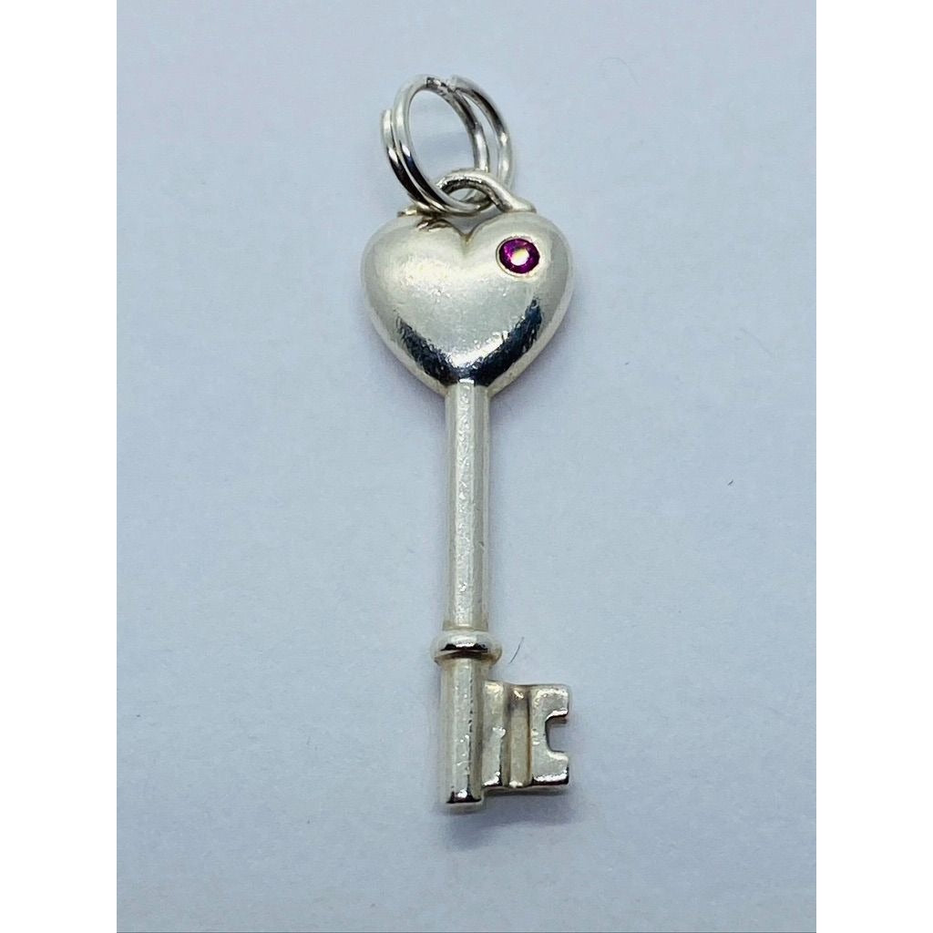 Tiffany & Co. Sterling Silver Pink Sapphire Heart Key Style Pendant 28MM